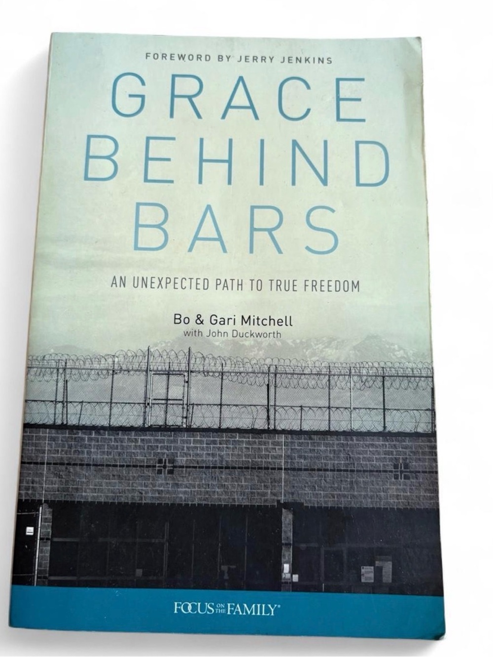 Grace Behind Bars by Bo & Gari Mitchell - Light Blue Cover